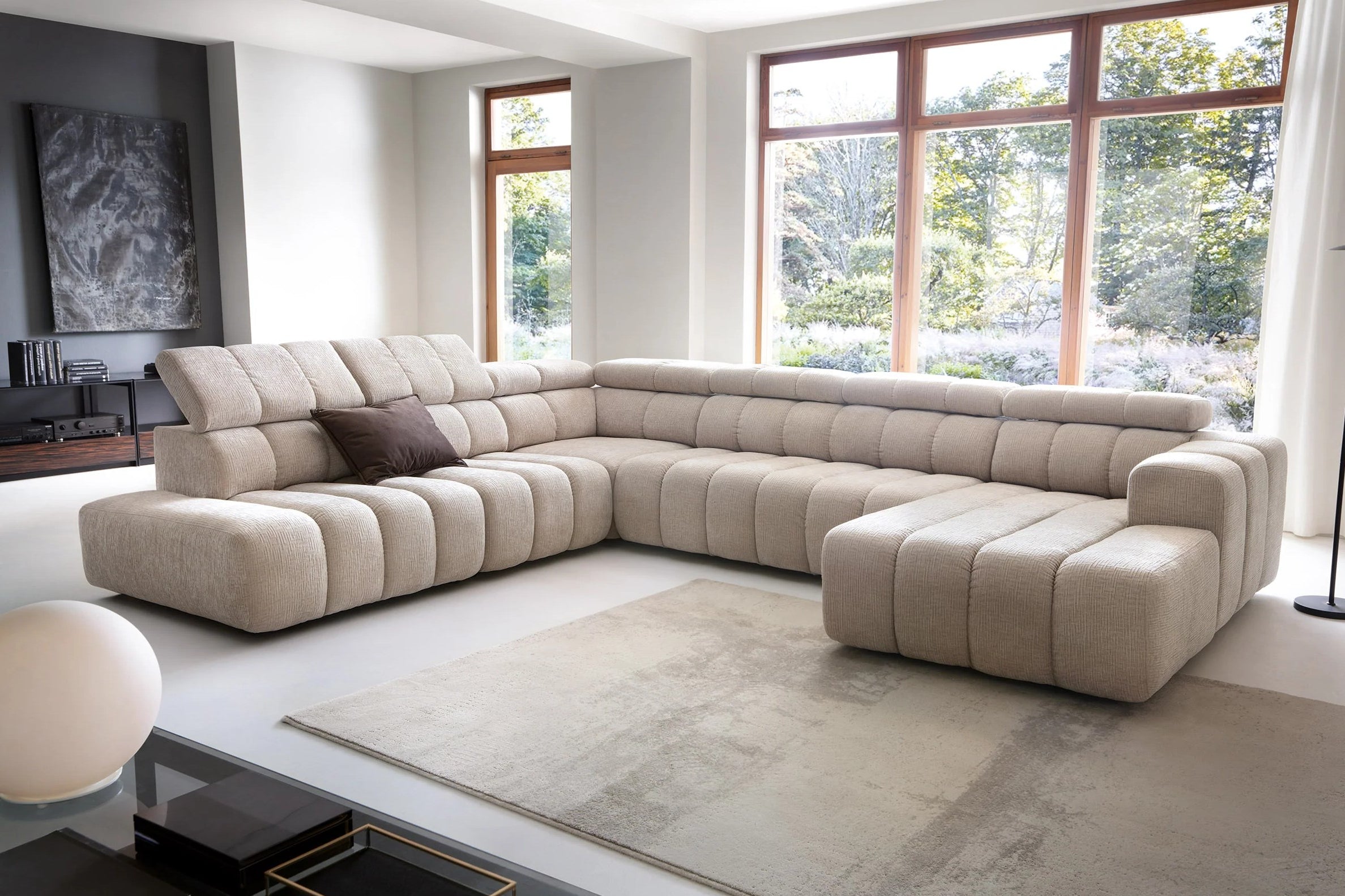 Designer Wohnlandschaft Zürich mit elektrischer Sitzverlängerung in Chenille